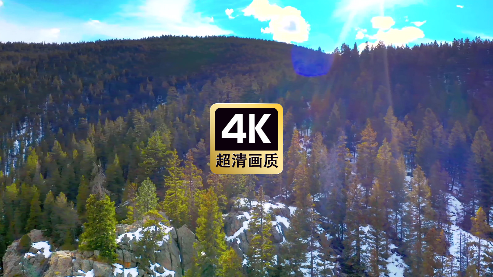 阳光照耀雪原山林