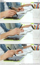 2K设计师在手绘板上绘画工作