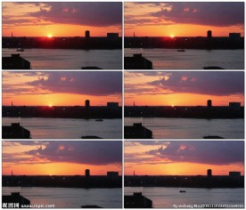 夕阳下在河中行驶的船