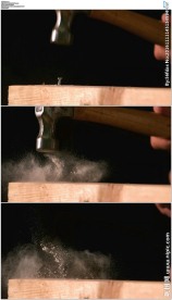 铁锤在木板上钉钉子慢动作