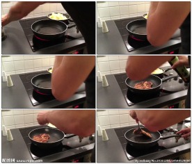 在电炉上煎肉烹饪