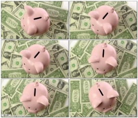 扑满坐在钞票上的顶视图