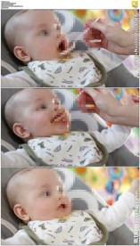 母亲给孩子喂饭