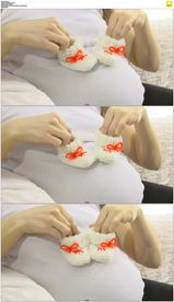 孕妇拿着婴儿鞋