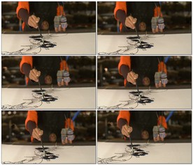 马来西亚妇女在画蜡染画