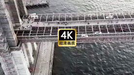 航拍跨海大桥上行驶车辆