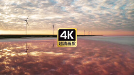 唯美风景夕阳下海边转动的风车