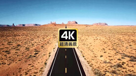 航拍汽车在沙漠荒野高速公路行驶