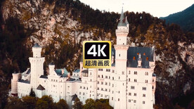 航拍群山间高耸的欧式古城堡