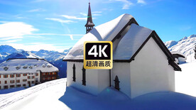 航拍雪山山脚下的教堂
