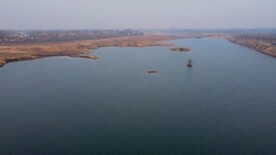 航拍夕阳下大江大河船湖面视频