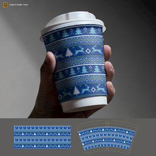 手持蓝白图案纸杯特写